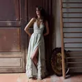 Elegant floral print maxi dress with high slit and ruffles in a vintage vacation style - XS / Dresses / Green