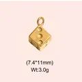 Detailed view of a vintage gold-colored stainless steel dice charm for jewelry making - Dice Style (DHS-6755)