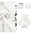 Detailed view of white cotton-linen fabric texture and V-neck ruffle puff sleeve set - S / Top And Bottom / White