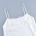 Detailed view of elegant white camisole with delicate eyelash lace trim and thin straps - S / Tops / White