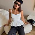 Elegant white peplum camisole top with a slim fit design for stylish women's casual wear - S / Tops / White