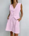 Detail shot of a pink linen two-piece set featuring a V-neck vest and matching shorts - S / Top And Bottom / Light Pink