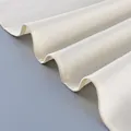 Close-up of ivory frosted velvet fabric texture for winter windbreaker jacket SKU. - Ivory