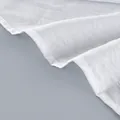 Nahaufnahme von hochwertigem weißem Netzstoff mit elegantem Rüschensaum für Set - S / Oberteil Und Unterteil / Weiß