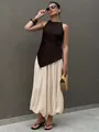 Detailed view of summer loose cream-colored bubble pants with elastic cuffs for women. - S / Khaki