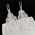 Detailed view of elegant cream lace V-neck camisole featuring delicate eyelash fringe - S / Tops / Apricot