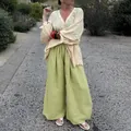 Stijlvolle groene gestreepte broek met wijde pijpen voor dames in een zomerse outfit - S / Bottoms / Groen
