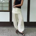 Elegante crèmewitte geplooide lantaarnbroek voor dames met een losse harempasvorm - S / Bottoms / Wit
