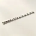 Detailed view of silver-toned Italian modular bracelet with embossed letter D links - Letter D / Set of 18