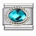 Close-up of stainless steel Italian charm with aquamarine blue faceted gemstone. - Blue Green Style