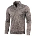 Close-up of men's quarter-zip sweatshirt with brown heathered knit pattern - Coffee
