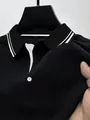 Detailopname van zwart mesh ijszijde poloshirt met stoftextuur en gestreepte kraag - S / Tops / Zwart