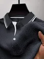 Detailopname van zwart mesh ijszijde poloshirt met ademende wafeltextuur - S / Tops / donkergrijs