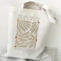 Aesthetic cream canvas tote bag featuring Matthew 6:33 Bible verse and floral print - Scripture Quote (STD2097-D) / White