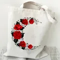 Canvas tote bag featuring a vibrant red rose and floral moon print design for daily use. - Red Rose Moon (STD2097-G)