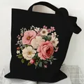Black canvas tote bag featuring an elegant pink and white vintage rose floral print - Mixed Floral (STD2097-Q Black)