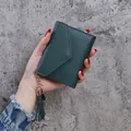 Compact dark green women's wallet featuring lychee pattern and gold tassel pendant - Green