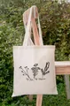 Close-up of cream canvas tote bag featuring No Rain No Flowers black floral print - 35*40cm / Black And White Plant Line Print (4)