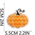 Macro view of festive Halloween pumpkin embroidery patch with dimensions in cm and inches - Wave Pattern Pumpkin Style (C23NG-095-12)