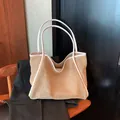 Elegant large capacity woven straw tote bag with white faux leather trim for beach or commute - White