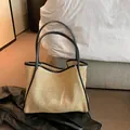Woven straw tote bag with black handles, large capacity for beach and daily commute - Black