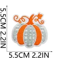 Close-up of artistic pumpkin embroidery patch with dimensions 5.5cm or 2.2in for DIY crafts. - Orange and Green Striped Style (C23NG-125-45)
