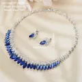 Elegant bridal jewelry set featuring blue crystal necklace and matching silver earrings - Style C / Blue