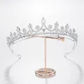 Detailed close-up of a silver bridal crown tiara with sparkling white rhinestones - Style A Silver Base White Rhinestone & Zirconia (HG1260) / Silver