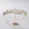 Detail shot of an elegant rose gold bridal tiara crown with sparkling rhinestones - Style B 16K Gold White Rhinestone & Zirconia (HG1260) / Gold