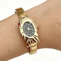Elegant gold fish-shaped fashion watch for women with a dark dial on a wrist. - 5465-Gold Black