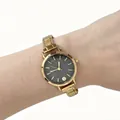 Detail view of a gold stainless steel modular watch with a black starry textured dial. - Gold Black Dial Modular Watch(4620) / Gold