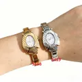 Elegante orologio al quarzo ovale con design pesce volante e cinturino a maglie metallo - Stile Pesce Volante Quadrante Viola (5459) / Argento