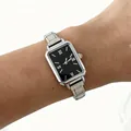 Close-up of a women's silver steel strap quartz watch with a black rectangular dial - Silver Square Dial Black