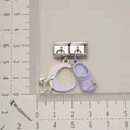 Eslabón de pulsera italiana con dijes de luna y zueco, mostrado con una regla métrica - Estilo 3 / Luna Rosa Púrpura Y Zueco Púrpura