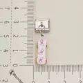 Detailed view of pink skateboard heart charm on stainless steel Italian modular link. - Angel Heart Skateboard Charm (Single 4)