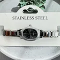 Detailed view of women's silver oval quartz watch with modular stainless steel band - Oval Black Dial Modular Style (5158) / Silver