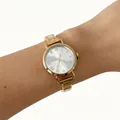 Elegant goudkleurig dameskwartshorloge met afneembare roestvrijstalen schakelarmband om pols - Cremewitte Ronde Wijzerplaat (4698)