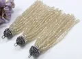 Detailed view of champagne crystal tassel pendants with sparkling rhinestone caps - 6cm Long Tassel Style (H001) / 12 Strands 6cm Tassels / Champagne