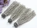 Detailed macro view of faceted grey crystal bead tassels with pavé rhinestone caps for jewelry - 6cm Long Tassel Style (H001) / 12 Strands 6cm Tassels / Transparent Gray