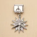 Macro view of a silver stainless steel Italian charm module featuring a sparkling star pendant - Star Burst with Rhinestones (6)