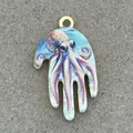 Detail of a copper octopus pendant charm for ocean themed DIY jewelry making - Purple Octopus Style