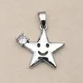 Detailed view of a silver star pendant with a smiley face and a sparkling gemstone - Smiling Star / Pendant Only (No Chain)