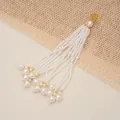 Elegant handcrafted multi-strand white pearl tassel pendant for jewelry making. - White