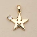 Close-up of a gold copper star pendant featuring a smiley face and a sparkling crystal stone - Smiley Star (1) / Gold