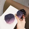 Fashionable oversized rimless sunglasses featuring purple gradient lenses and gold frame - Single Sunglasses / Transparent Purple Pink