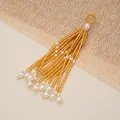 Elegant golden beaded tassel pendant accented with white faux pearls for DIY jewelry - Gold
