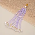 Elegant handcrafted lavender beaded tassel pendant with white pearl accents for jewelry - Light Purple