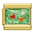 Close-up of gold stainless steel Italian charm with three hearts on green glitter - Three Hearts Glitter Style (ICJ877)