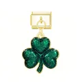Detailed view of a glittery green shamrock pendant on a gold Italian modular link charm. - Clover Gold Buckle