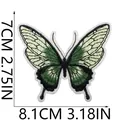 Dettaglio della toppa ricamata a farfalla verde con dimensioni di 8,1 cm x 7 cm. - 7x8.1cm